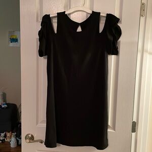 Exposed shoulder black dress